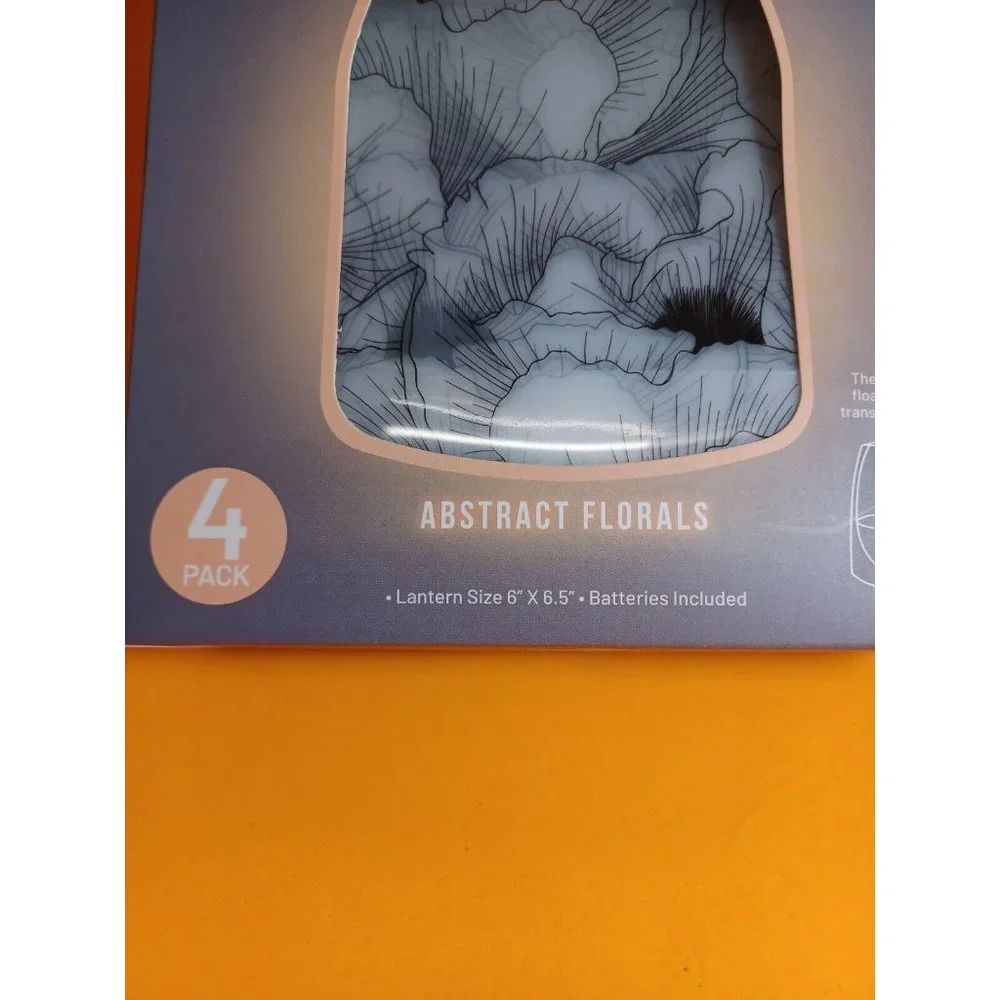 Glowing LED Lanterns With Floating Flameless LED Candles Luminaries Set of 4 NEW